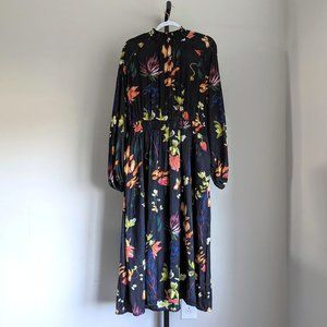 Long Sleeved Black Smocked Midi Dress With Floral Print
